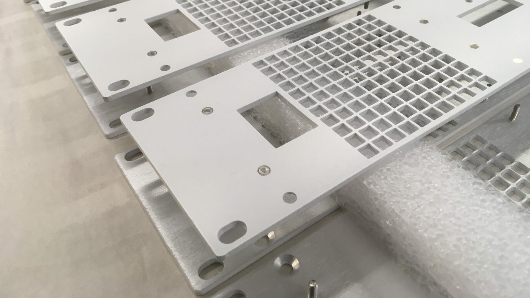 machined front panels painted with hardware installed